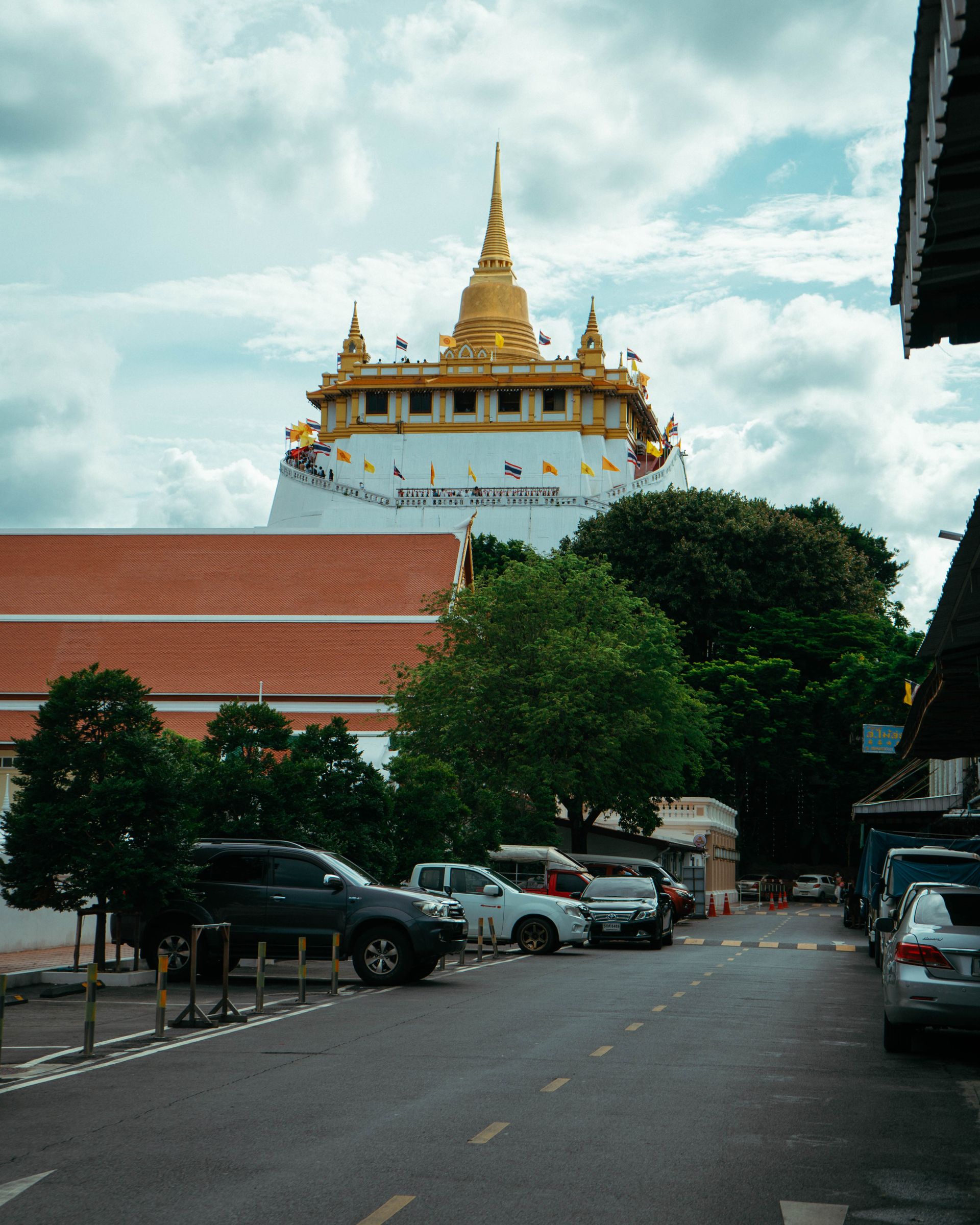 Stunning view of the Golden Mount stupa in Krung Thep Maha Nakhon, Thailand on a cloudy day.
