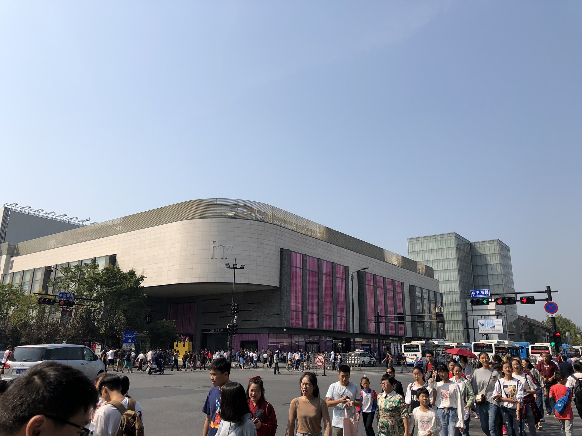 Low angle view of Hangzhou Century Center skyscrapers against a clear sky.
