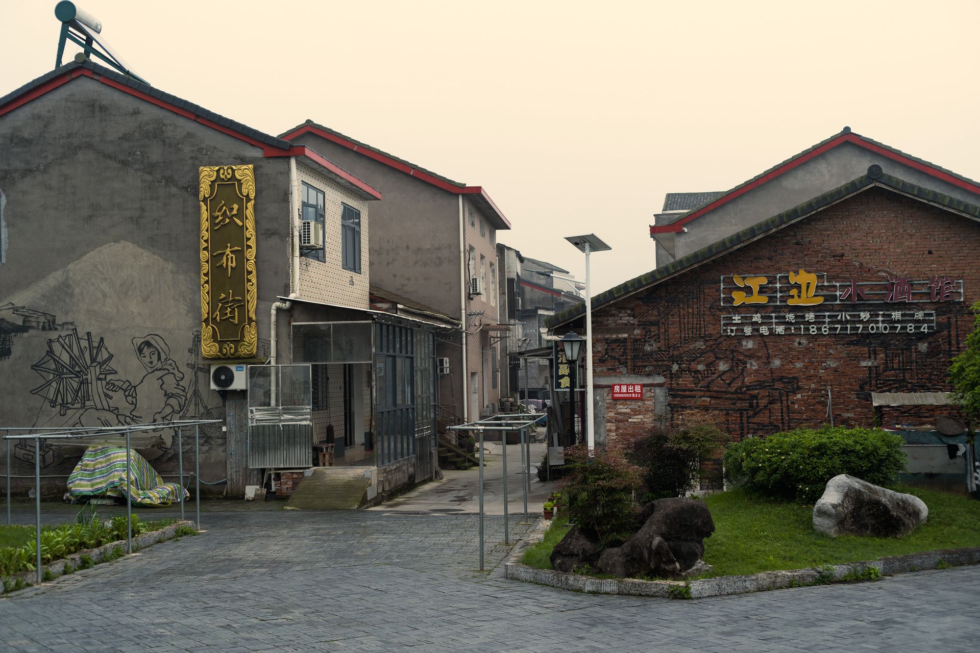 Traditional street scene with historic buildings and signage in Hubei, China.