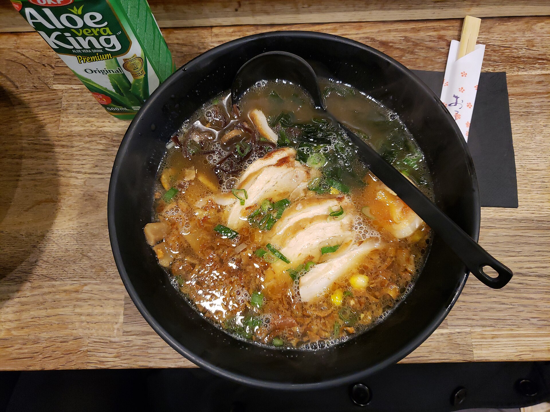 "Tonkotsu Ramen"'s description on menu: "In a rich Tonkotsu pork broth with Nitamago egg. Kikurage mushrooms, crispy shallots, Menma seasoned bamboo and Kamboko (fish cake)"